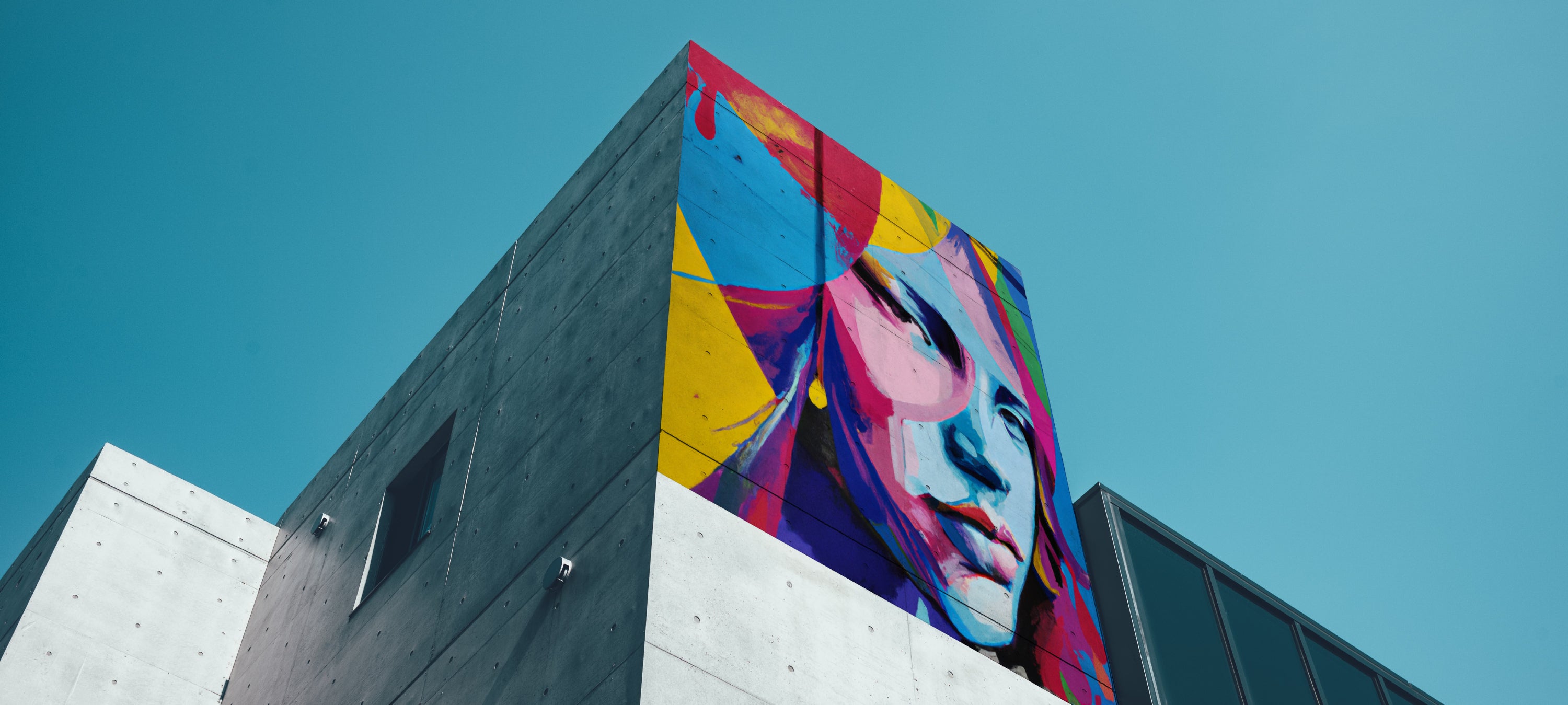 A colourful graffiti on a concrete building