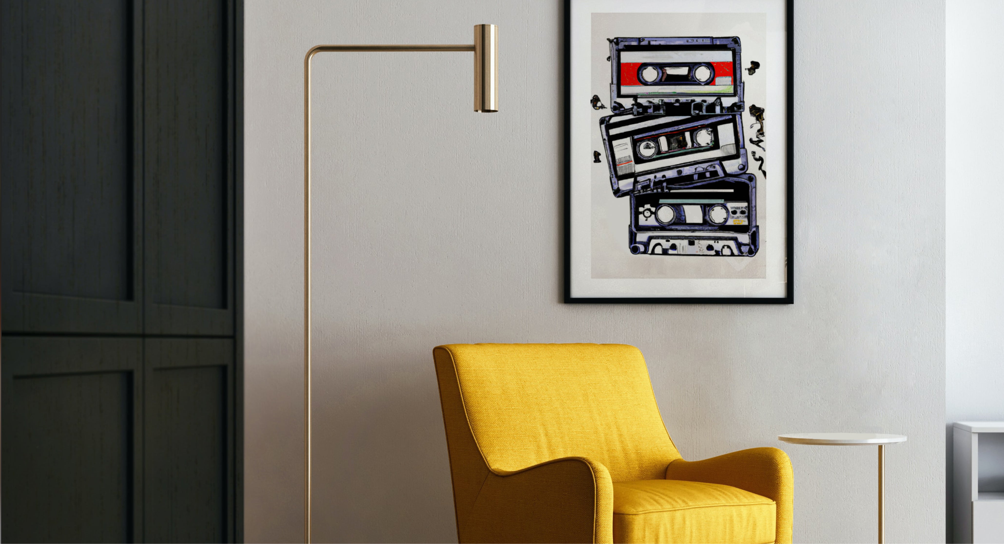 A room with a golden lamp and yellow chair next to a framed poster showing cassette tapes