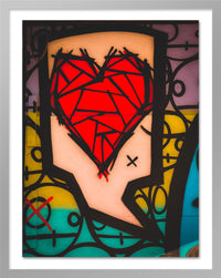 A poster that depicts a graffiti representing a red heart